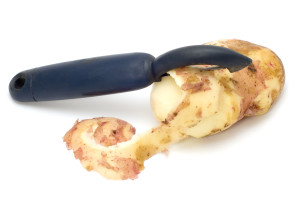 series object on white - kitchen utensil potato peeler